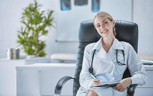 specialist doctor is sitting office chair with stethoscope around his neck